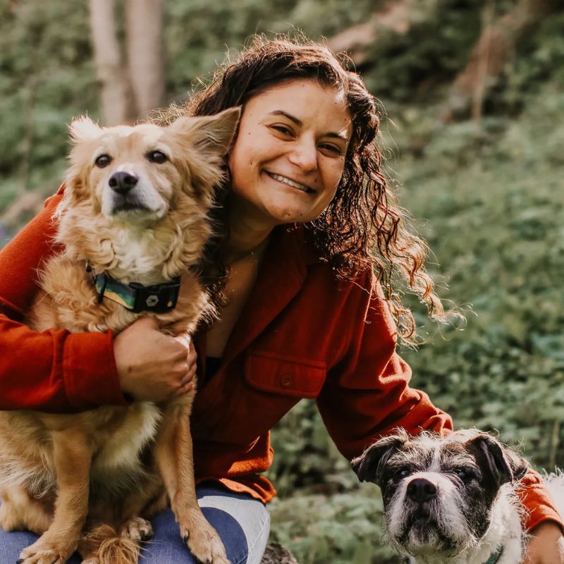 Kristen Board, certified dog trainer and behavior consultant, with her dogs